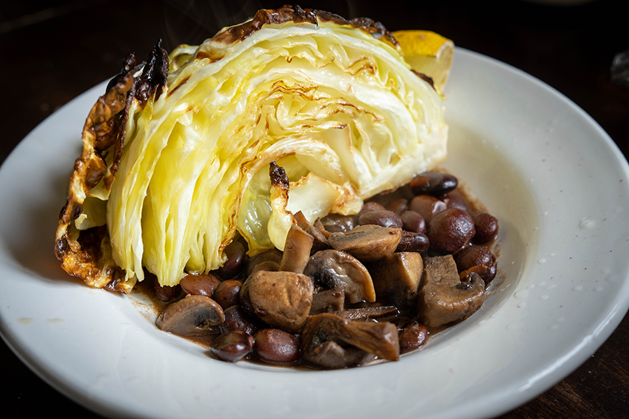 Rancho Gordo cooked beans with mushrooms and roasted cabbage 
