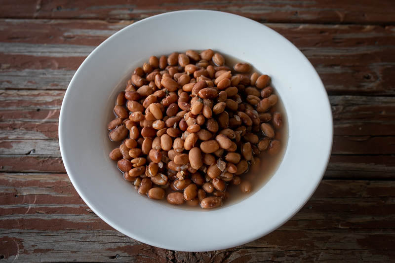 A white bowl with cooked Buckeye beans- Rancho Gordo