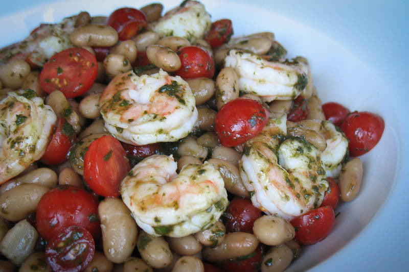 Mayocoba bean salad with shrimp and half cut cherry tomatoes, mixed with pesto - Rancho Gordo, Heirloom beans