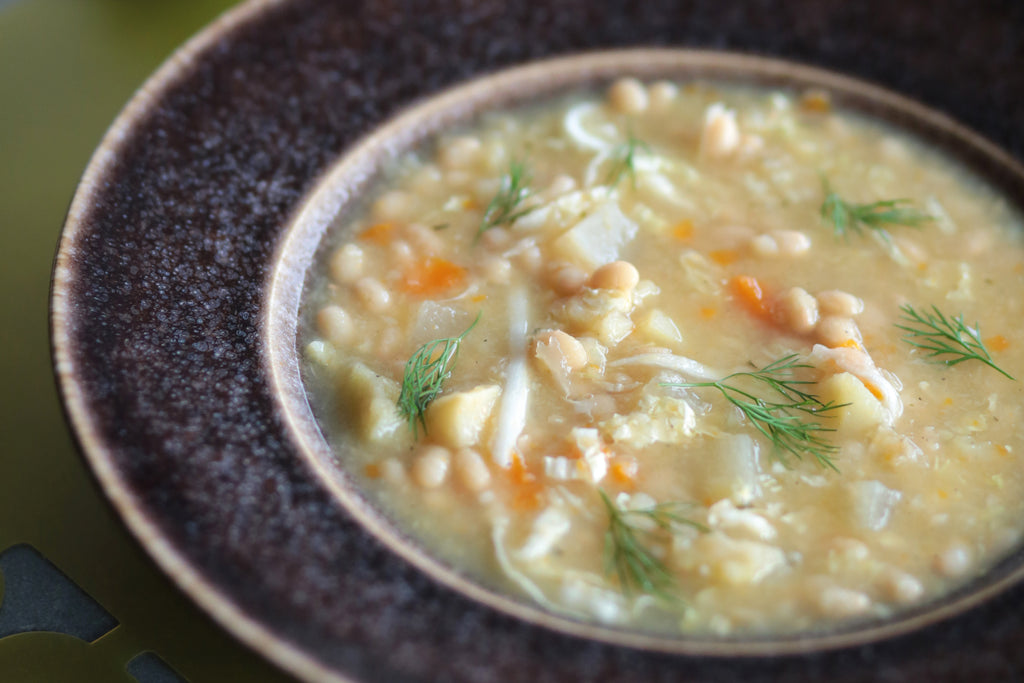 LEMONY BEAN & BRASSICA SOUP WITH NAPA CABBAGE & DILL