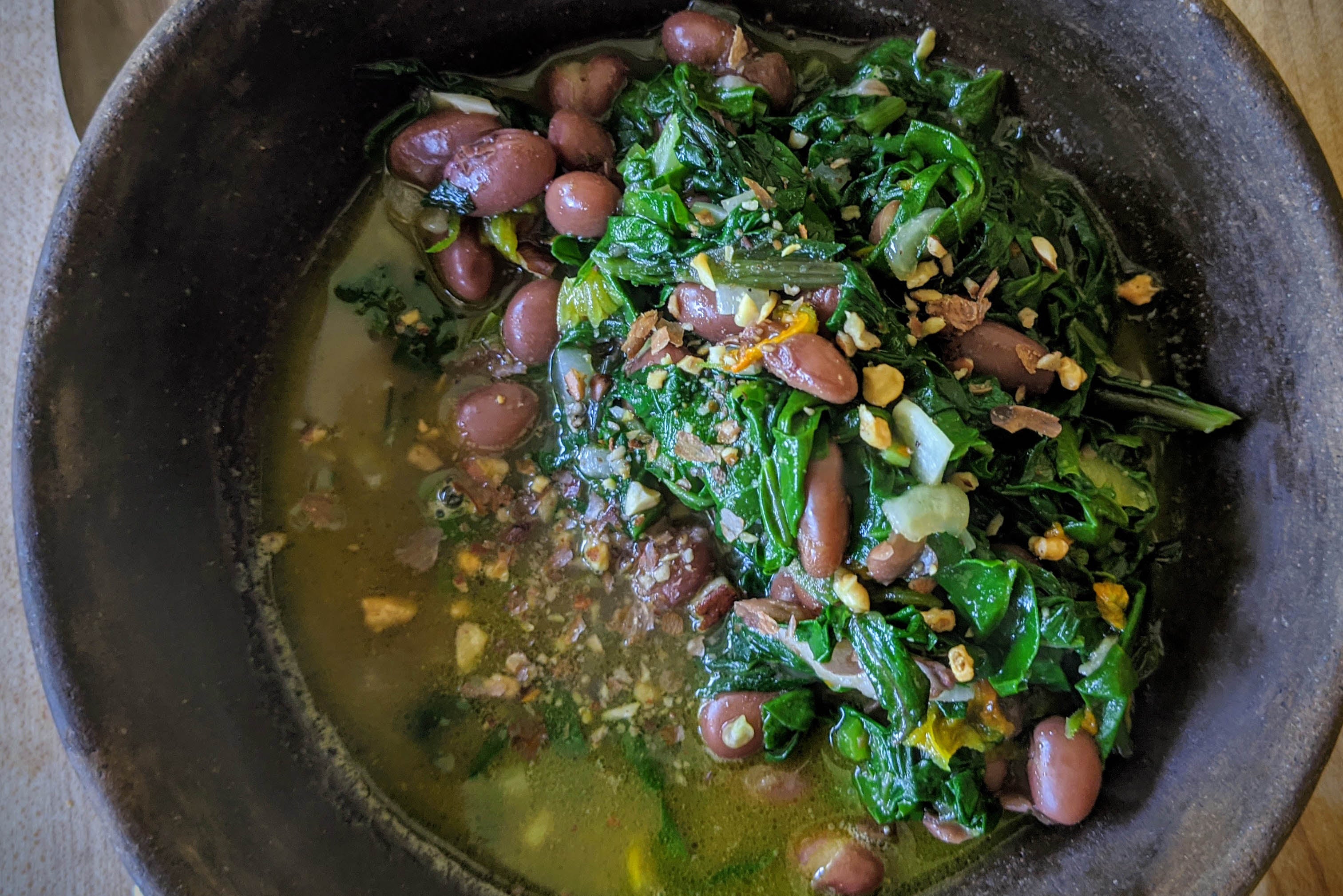 Rancho Gordo cooked King City Pink bean with chard and finely chopped nuts 