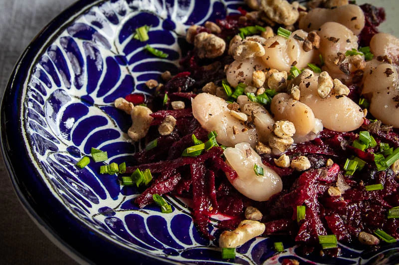 Raw Beet Salad with White Beans, Pomegranate Seeds, and Black Walnuts