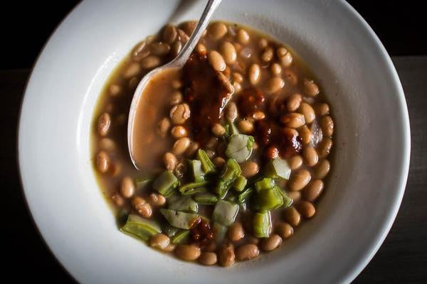Cooked Rancho Gordo Buckeye beans with cactus and salsa