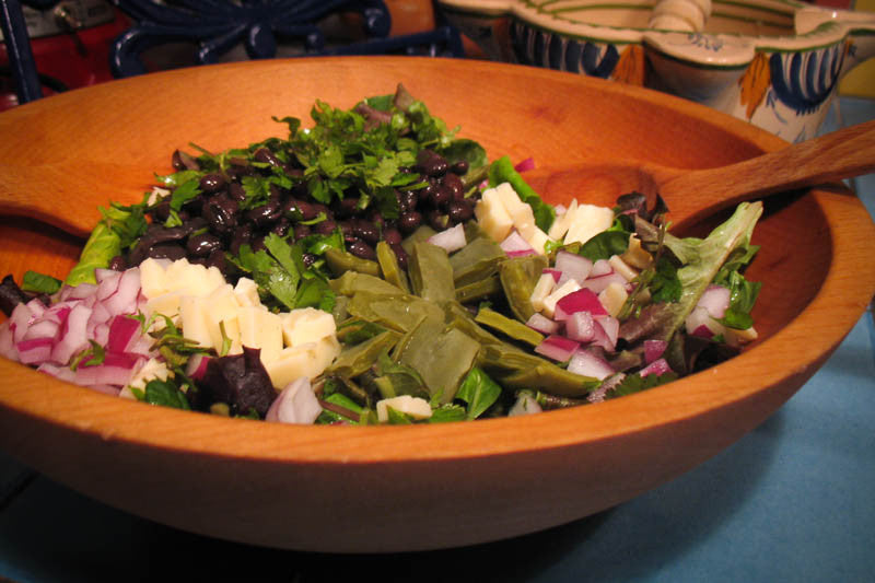 Mixed salad with diced red onion, and nopales with Midnight - Rancho Gordo, Heirloom beans