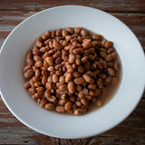 A white bowl with cooked Buckeye beans- Rancho Gordo