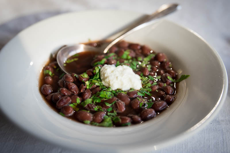 Rancho Gordo cooked Hidatsa Red Bean with herbs and cottage cheese.