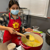 Rancho Gordo female employee cooking yellow polenta 