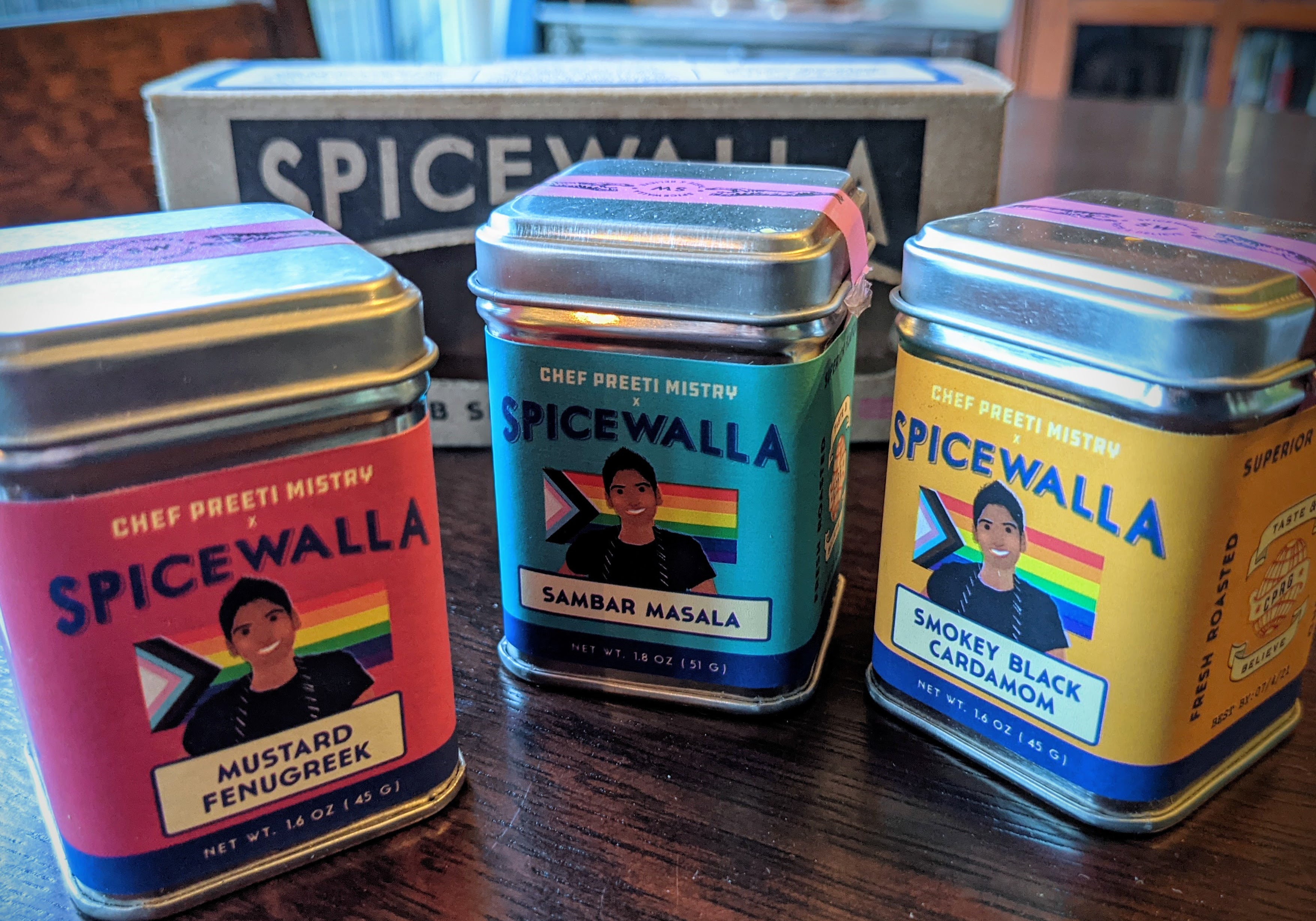 3 spice tins with labels 