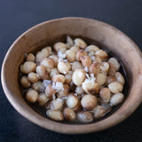 Plain cooked Papa de Rola beans in a small serving bowl