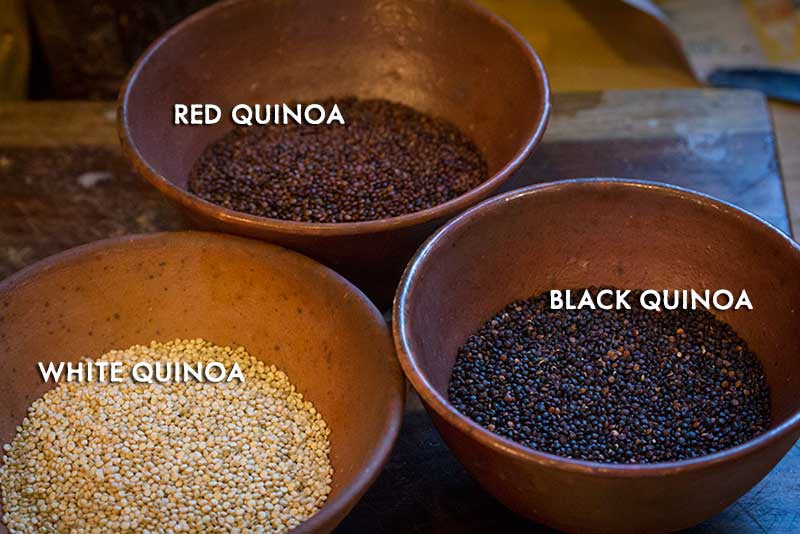 Three different bowls of Black Quinoa, Red Quinoa, and White Quinoa - Rancho Gordo