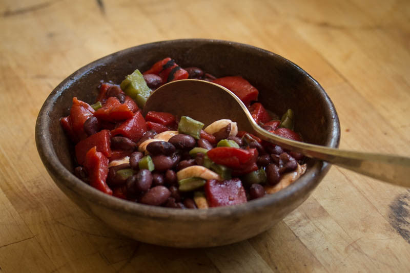 Bowl of cooked Domingo Rojo beans mixed with peppers and nopales, Rancho Gordo-Heirloom beans