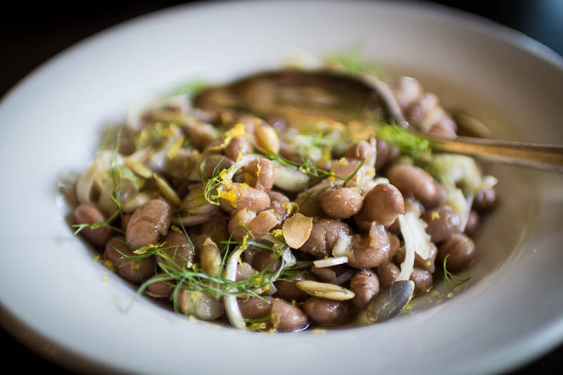 Cooked Cranberry beans with shallot, fennel, and pumpkin seeds.